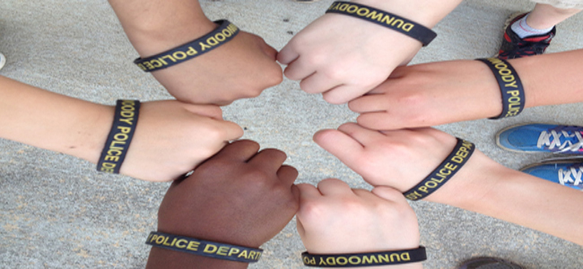 Children wearing Dunwoody Police wristbands