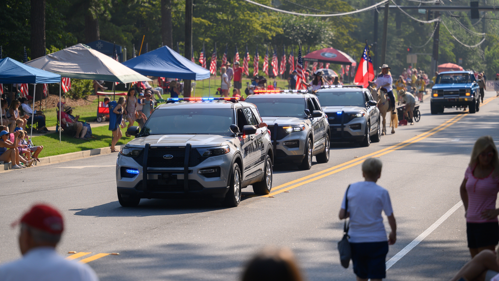 Police vehicles July 4th parade