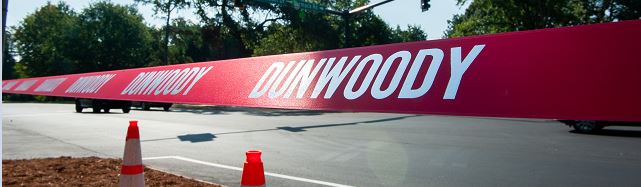 dunwoody ribbon pulled across new intersection