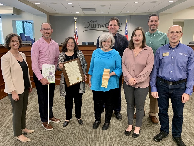 Sustainability Hero Laura Johnson with Mayor, Council and Nathan Sparks