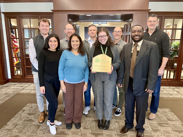 Dunwoody Sustainability Committee poses with Green Communities award