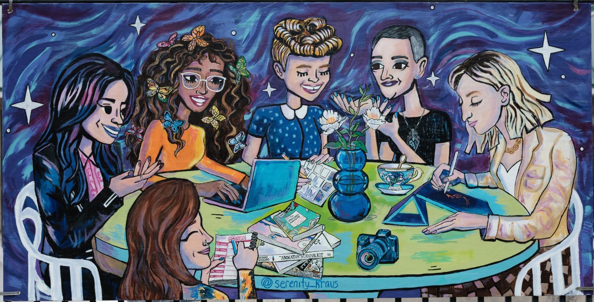 women's history month mural of female table meeting