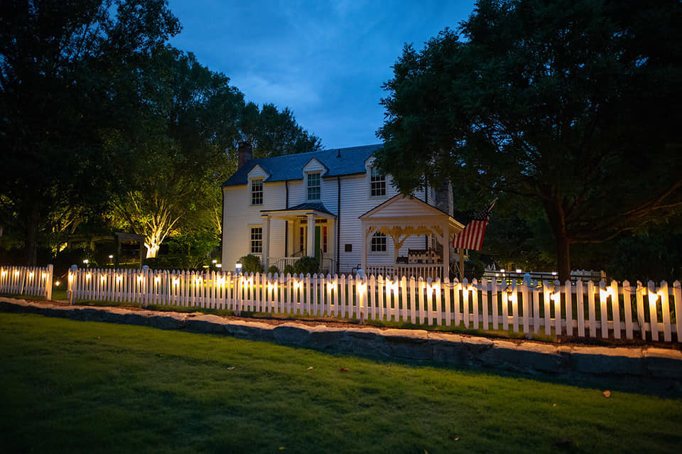 Donaldson-Bannister Farm main house with lights